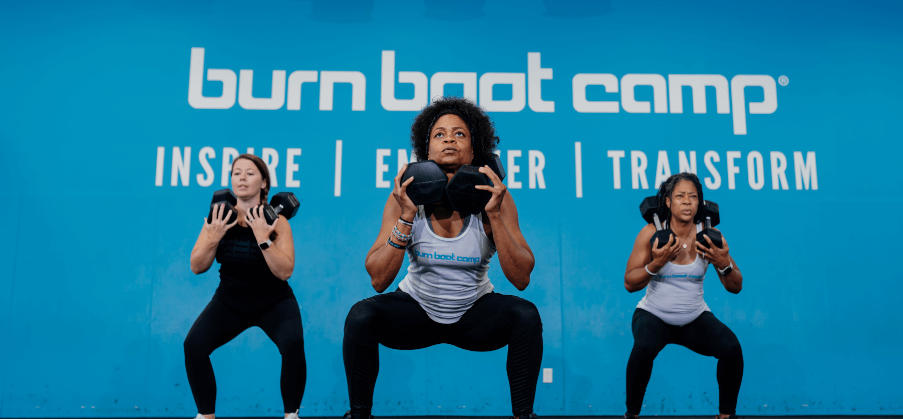 3 Woman doing squats with dumbbells for a black friday promo